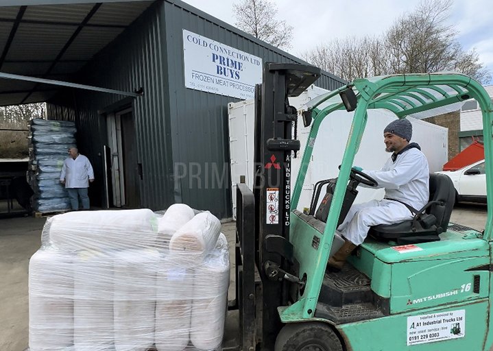 Forklift operator moving loaded pallets of frozen doner kebabs at Jarrow facility